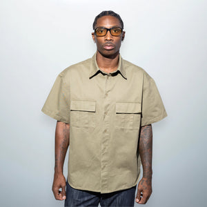 Khaki pocket shirt, 100% cotton, relaxed fit, designer fashion Unfolloworld by Serge Gakpé.

