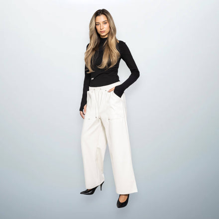 Cream vegan leather pants, tailored straight-leg fit, Serge Gakpé unfolloworld
