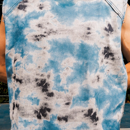 Blue digital print tie-dye sleeveless top with boxy fit and wide shoulders by UNFOLLOWORLD.