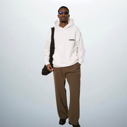 Oversized beige hoodie blend of 85% organic cotton and 15% post-consumer recycled polyester⎮Unfolloworld