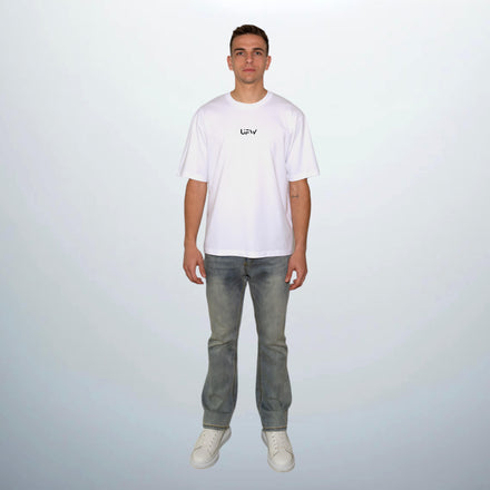 Martinos, standing 1m85, wears our slightly flared Blue Washed Retro Denim in size L