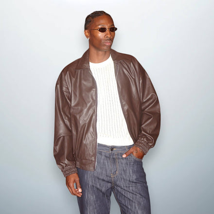 Brown jacket with a vintage-inspired design by Unfolloworld by Serge Gakpé